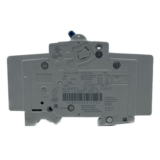 Side view of the circuit breaker, specifications label in English.